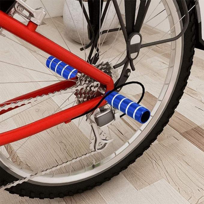A bicicleta BMX cavilha a liga que de alumínio o pé antiderrapagem da ligação para a montanha que dá um ciclo o conluio traseiro coube os eixos de 3/8 de polegada